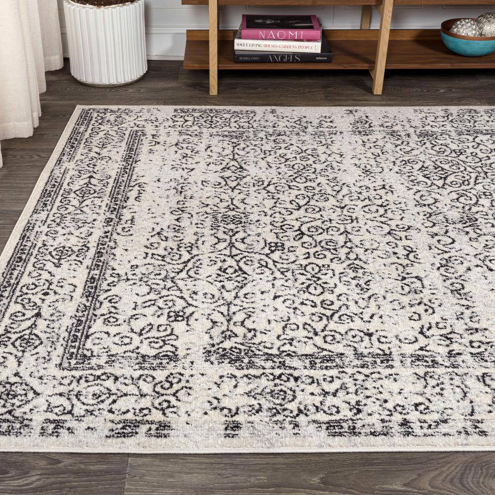 Black and White Filigree 4' x 6' Synthetic Area Rug