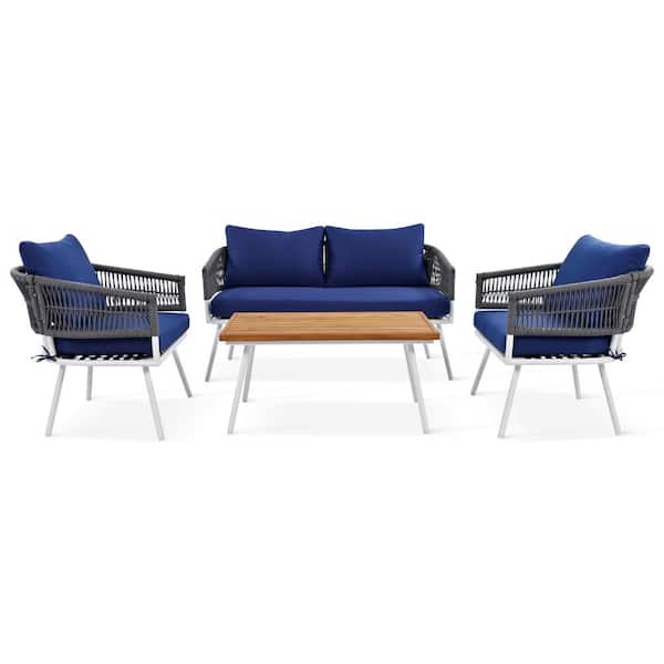 Zeus & Ruta 4-Piece Wicker Patio Conversation Set with Acacia Wood Table and Navy Blue Cushions for Backyard, Porch and Balcony