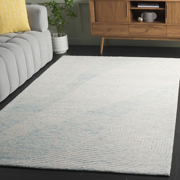 Pine 8 ft. x 10 ft. Turquoise/Ivory Abstract Wavy Area Rug