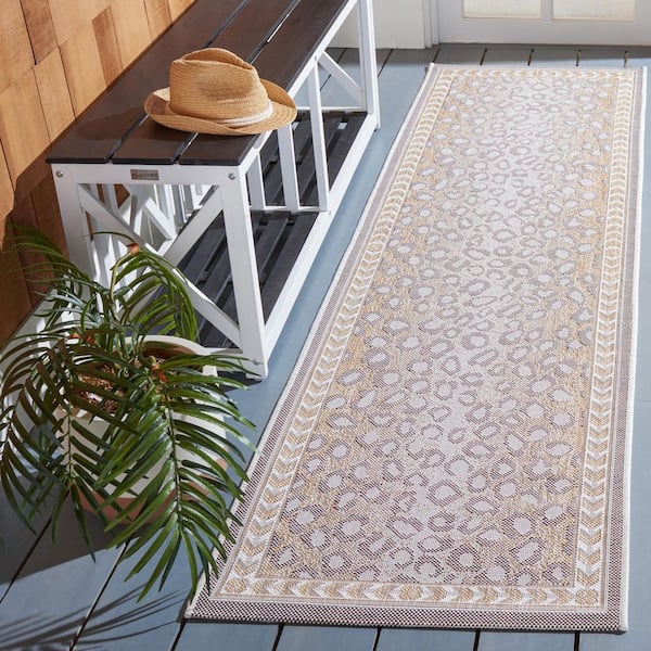 Courtyard Beige/Gold 2 ft. x 8 ft. Border Cheetah Indoor/Outdoor Runner Rug
