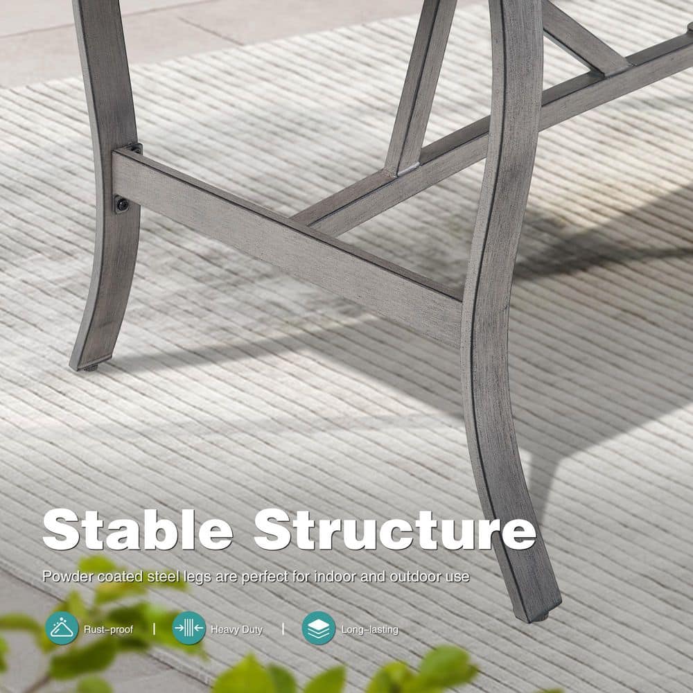 Close-up of the powder-coated steel legs of the dining table.