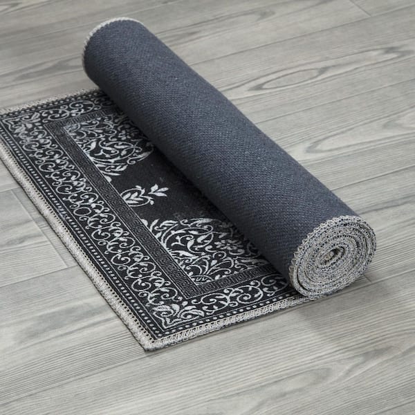 https://images.thdstatic.com/productImages/c02d6a68-b753-47f4-a2e7-bf52a7bd2e28/svn/7790-black-ottomanson-area-rugs-lsb7090-2x5-1d_600.jpg