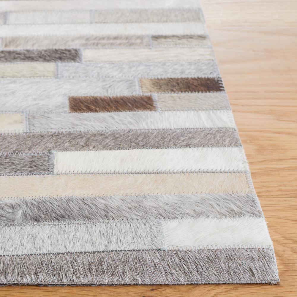 Ivory Geometric Hand-Knotted Cowhide Area Rug - 3' x 5'