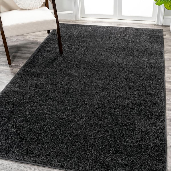JONATHAN Y Haze Solid Low-Pile Black 6 ft. x 9 ft. Area Rug