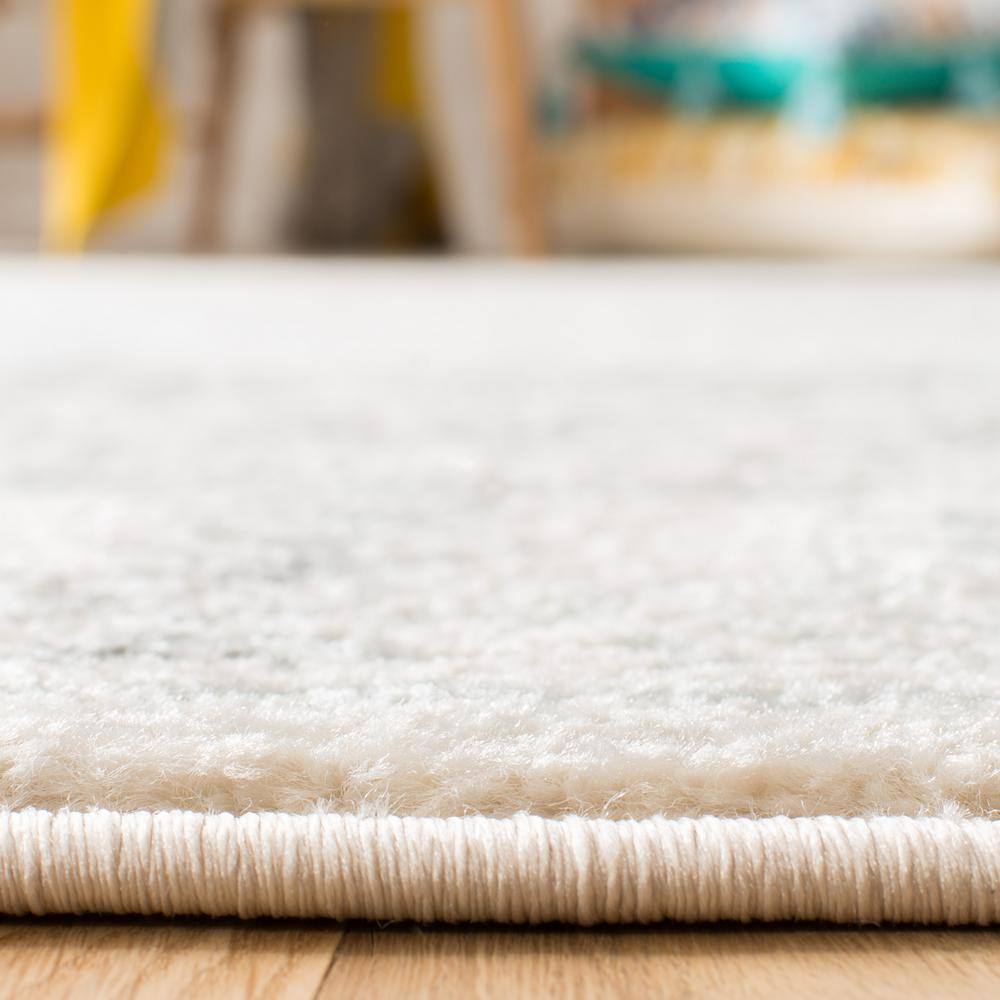 Ivory and Gray Rectangular Synthetic Area Rug