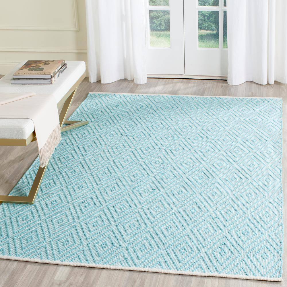 Turquoise and Ivory Cotton 5'x7' Geometric Flat Woven Rug
