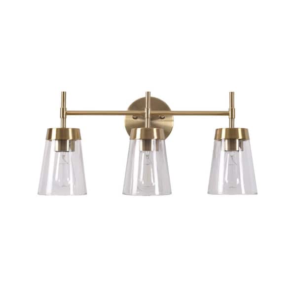 Manor Brook Bea 3-Light Antique Brass Vanity Light with Clear Glass
