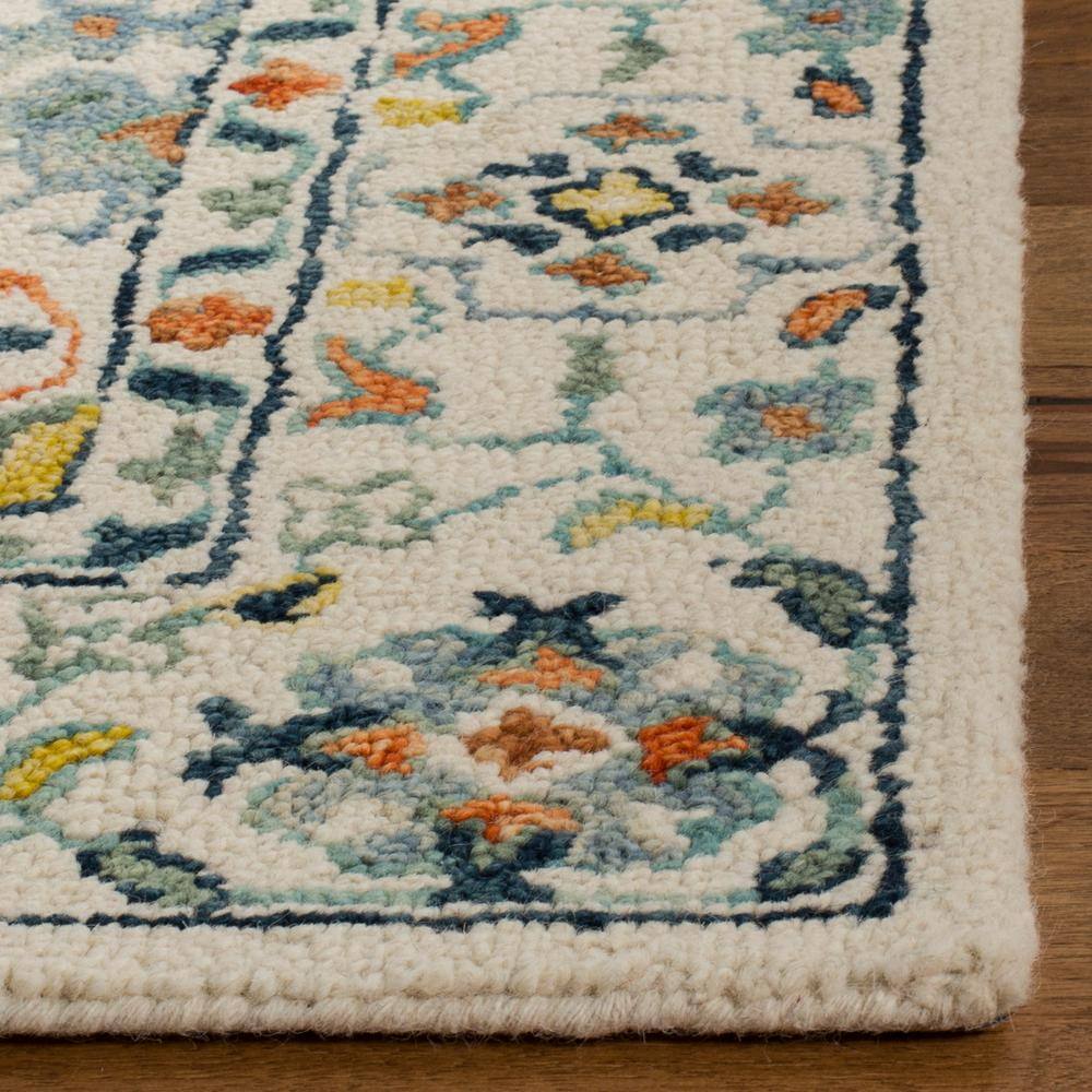 Handmade Tufted Blue Wool 3' x 5' Area Rug