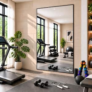 30 in. W x 71 in. H Rectangular Black Aluminum Alloy Framed Modern Oversized Wall Mirror