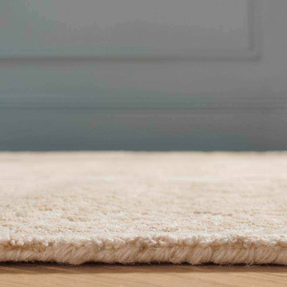 Ivory and Beige Floral Wool 6' x 9' Handmade Tufted Rug