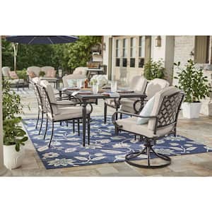 Laurel Oaks 7-Piece Black Steel Outdoor Patio Dining Set with CushionGuard Putty Tan Cushions