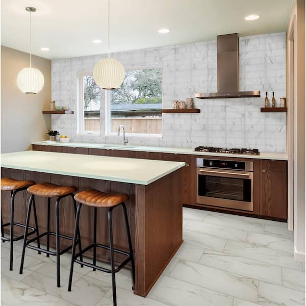 Florida Tile Home Collection Michelangelo Calacatta Rectified 12 in. x 24 in. Porcelain Floor and Wall Tile (13.3 sq. ft. /case) Florida Tile Home Collection Michelangelo Calacatta Rectified 12 in. x 24 in. Porcelain Floor and Wall Tile (13.3 sq. ft. /case)