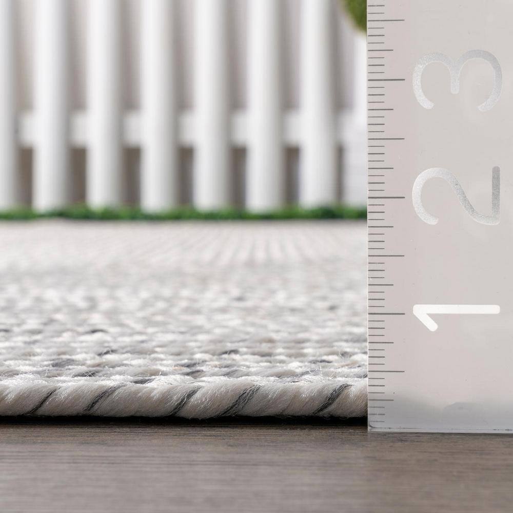 Handmade Ivory Braided 4' x 6' Oval Synthetic Area Rug