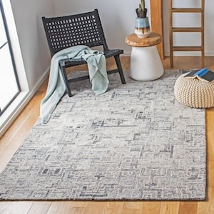 Abstract Ivory/Black 2 ft. x 3 ft. Distressed Geometric Area Rug
