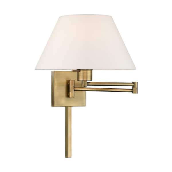 AVIANCE LIGHTING Atwood 1-Light Antique Brass Plug-In/Hardwired Swing Arm Wall Lamp with Off-White Fabrick Shade