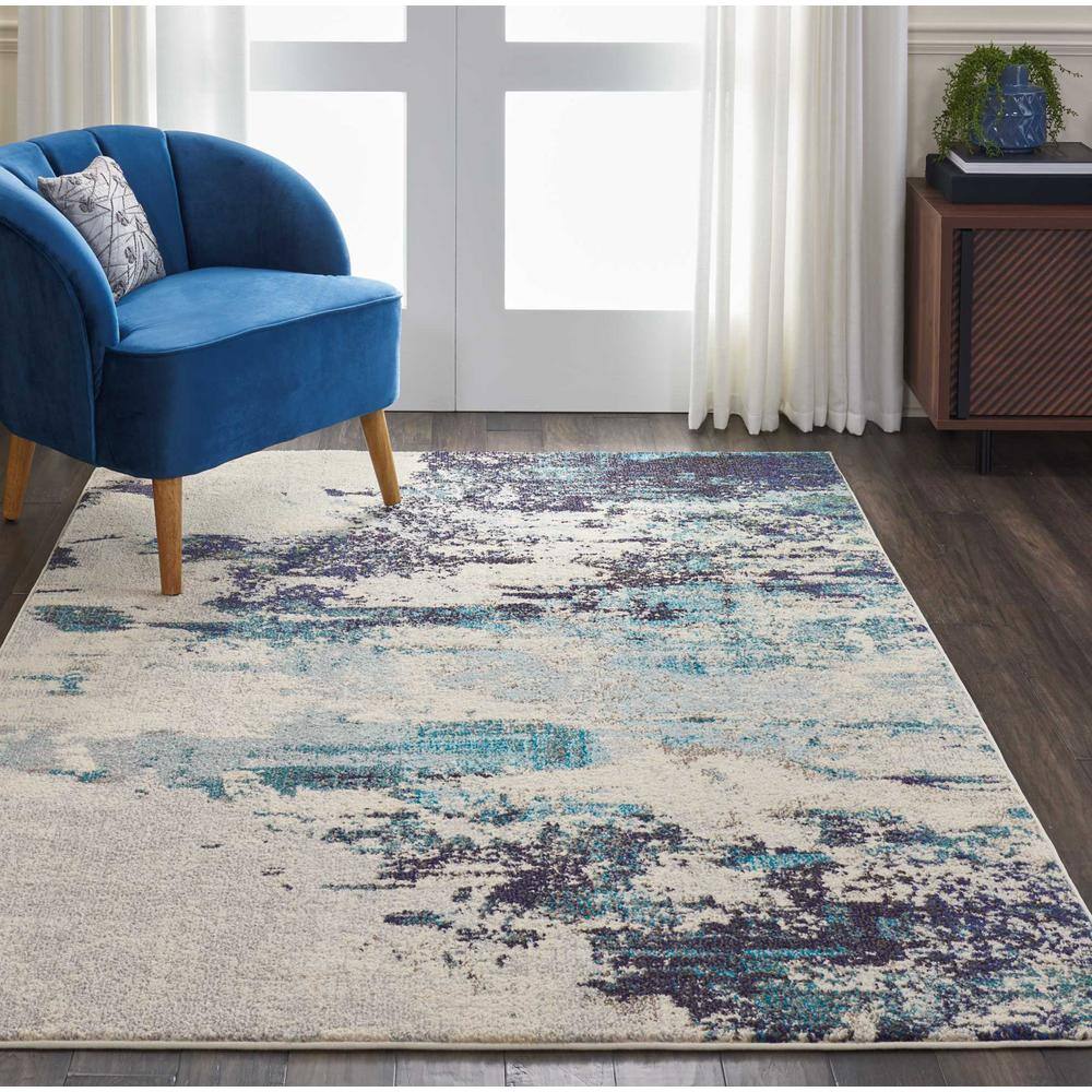 Abstract Blue and White Synthetic 5' x 7' Stain-Resistant Rug