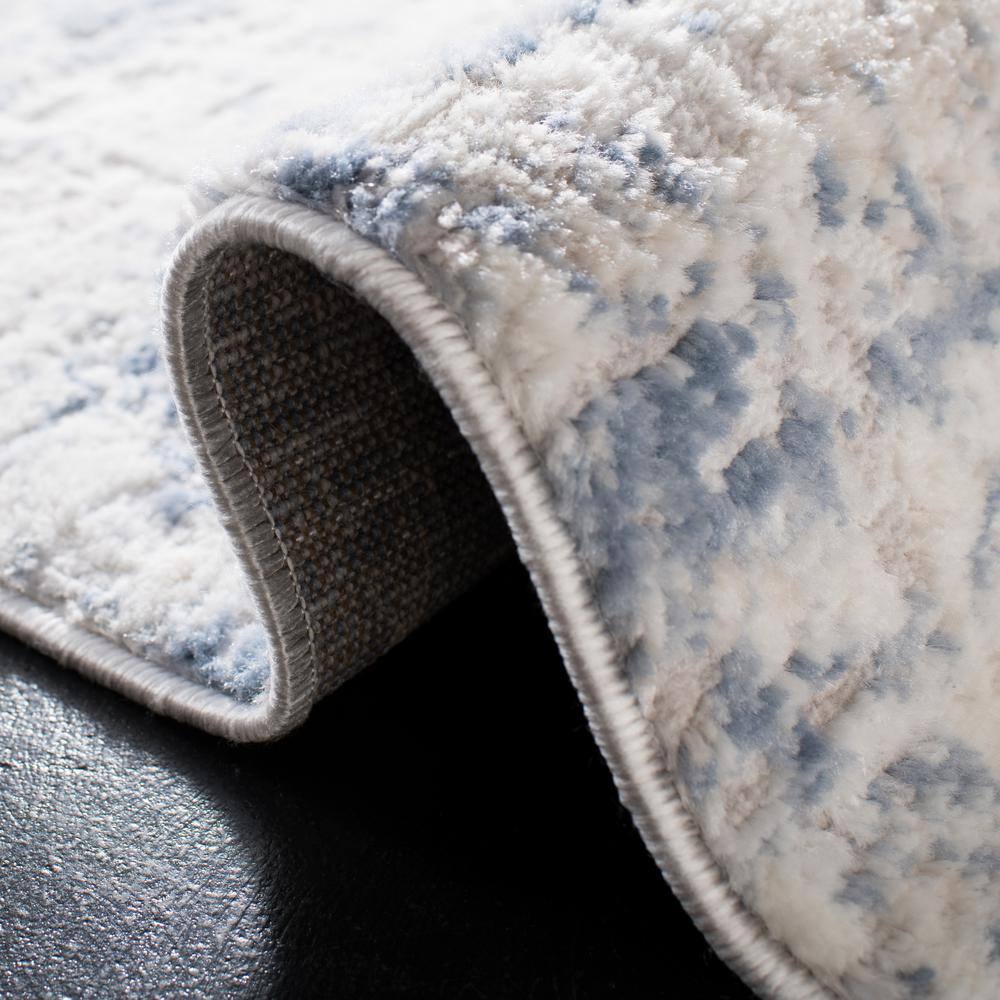 Ivory and Blue Abstract Hand-knotted Synthetic Runner Rug