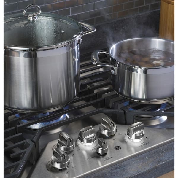 https://images.thdstatic.com/productImages/c0bf77e4-0191-4a38-9b19-79c146935da6/svn/stainless-steel-ge-profile-gas-cooktops-pgp9030slss-31_600.jpg