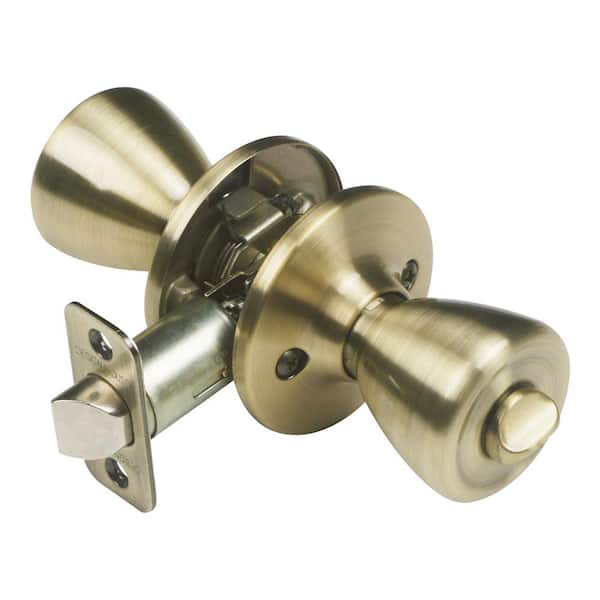 Design House Pro Tulip Antique Brass Privacy Bed/Bath Door Knob with Universal 6-Way Latch
