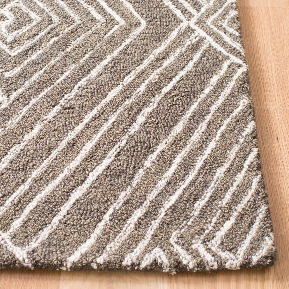 Handmade Dark Grey and Ivory Wool Tufted Round Area Rug