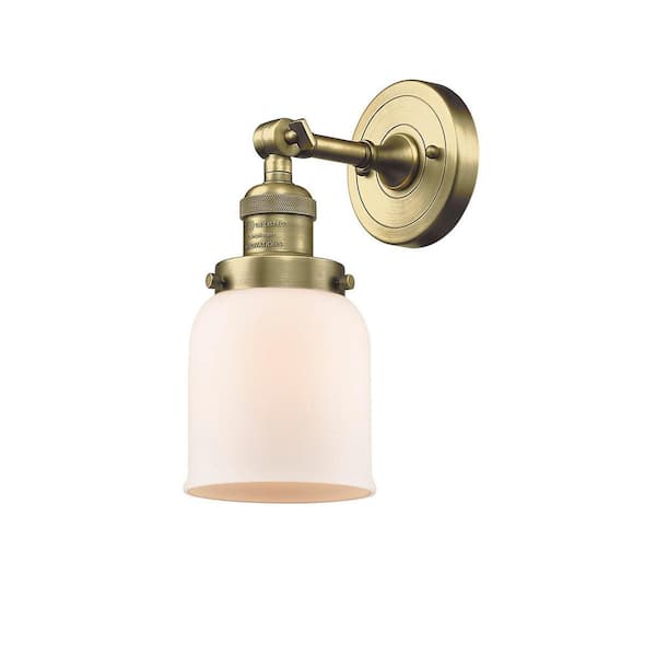 Innovations Bell 5 in. 1-Light Antique Brass Wall Sconce with Matte White Glass Shade