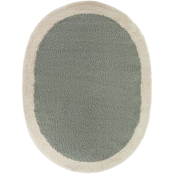 Odelle Cream 7 ft. x 9 ft. Oval Solid Border Area Rug