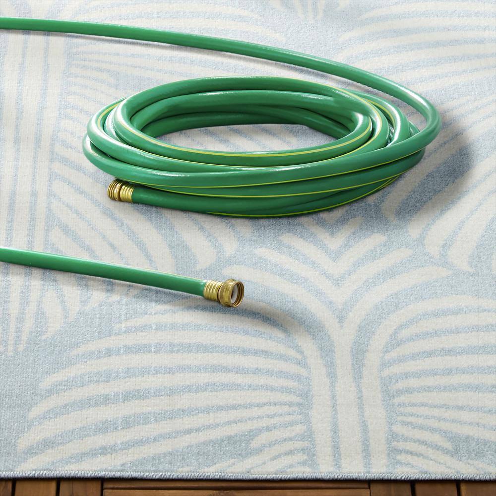 Lanai Blue and Ivory Palm Leaves Synthetic Indoor/Outdoor Area Rug