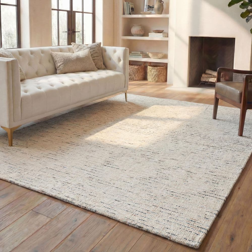 Abstract Ivory/Blue 8 ft. x 10 ft. Speckled Area Rug