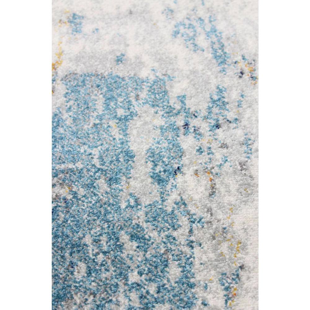 Ivory Abstract Elegance 31" Synthetic Easy-Care Area Rug