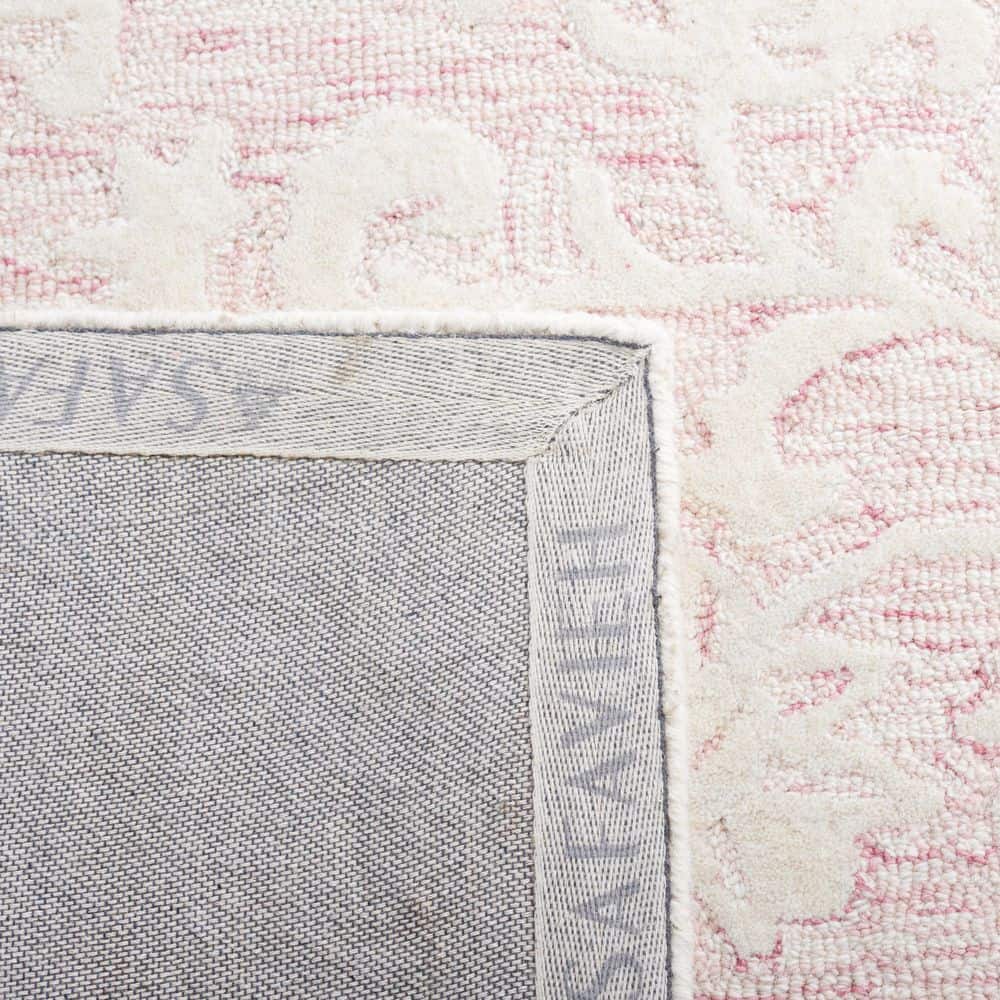 Handmade Pink and Ivory Tufted Wool 8' x 10' Area Rug