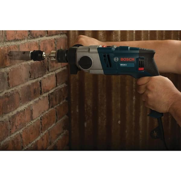 8.5 Amp Corded 1/2 in. 2-Speed Concrete/Masonry Variable Speed Hammer Drill with Auxiliary Handle and Depth Gauge 8.5 Amp Corded 1/2 in. 2-Speed Concrete/Masonry Variable Speed Hammer Drill with Auxiliary Handle and Depth Gauge