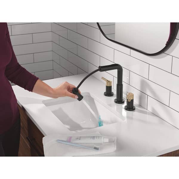 Nicoli Pull-Down Spout 8 in. Widespread Double Handle Bathroom Faucet Drain Included in Matte Black/Champagne Bronze