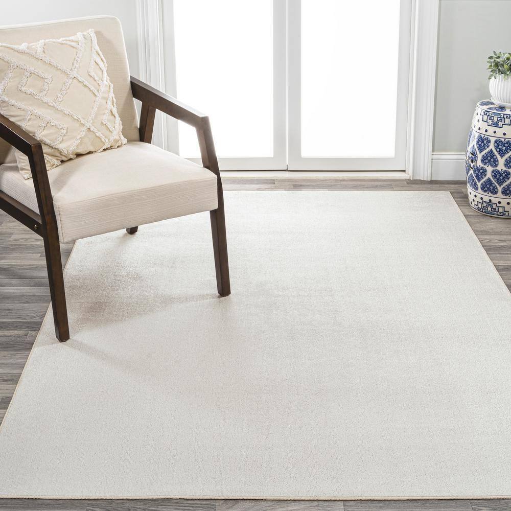 Cream 4' x 6' Synthetic Washable Rectangular Area Rug