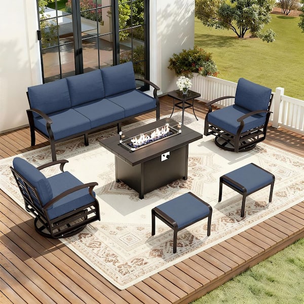 7-Piece Aluminum Patio Conversation Set with 2 Swivel Rocking Chairs, 2 Ottomans, a Fire Pit Table and Navy Cushions
