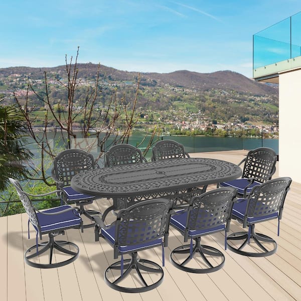 Vintage 9-Piece Cast Aluminum Patio Outdoor Dining Set with Oval Dining Table, 8 Swivel Chairs and 8 Blue Cushions