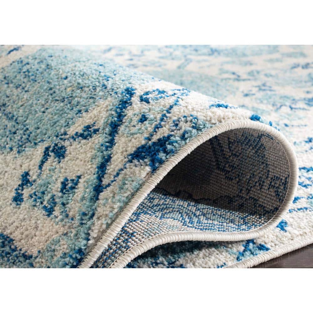 Beige and Turquoise 4' x 6' Synthetic Reversible Area Rug