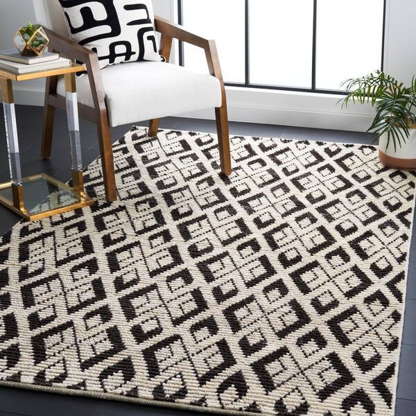 Tibetan 4 x 6 Ivory/Black Tribal Area Rug