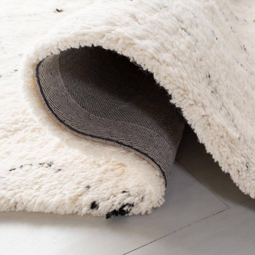 Ivory and Black Hand-Tufted Wool Shag Area Rug, 5' x 8'