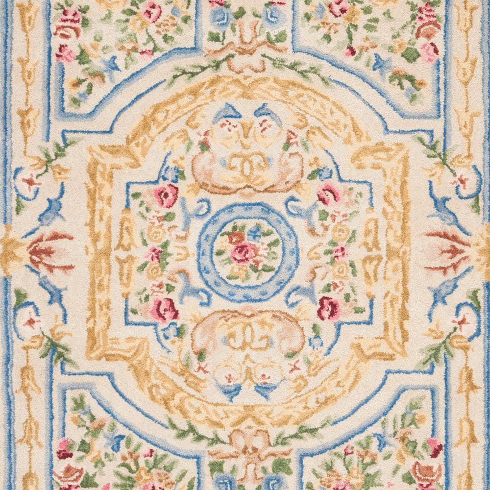 Handmade Blue and Ivory Wool 4' x 6' Tufted Area Rug