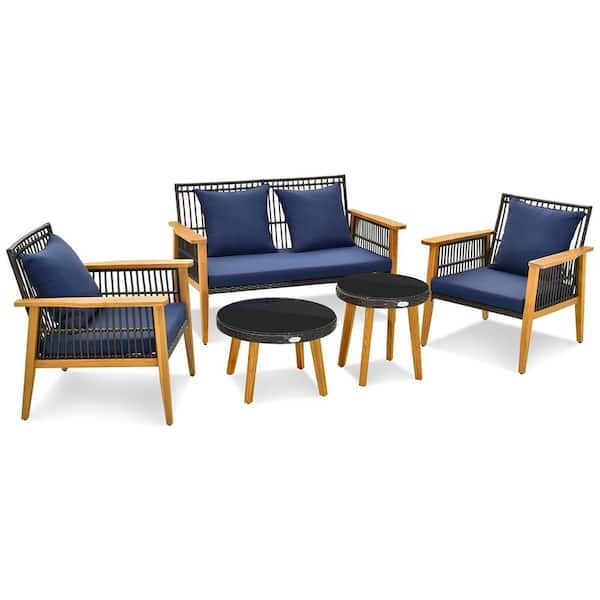 Costway 7-Piece Wood Patio Conversation Set Rattan Woven Chair Set with 2 Coffee Tables and 2 Ottomans and Navy Cushions