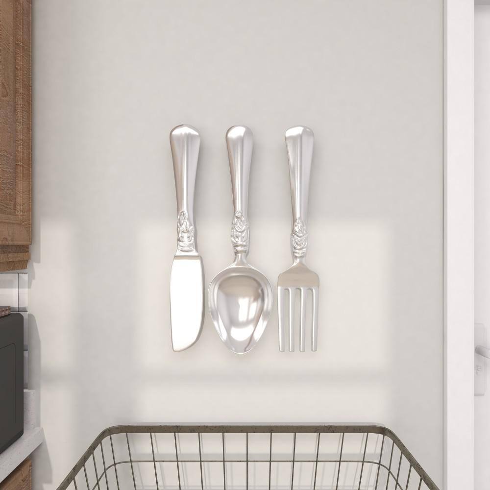 DecMode Silver Aluminum Knife, Spoon and Fork Utensils Wall Decor (3 Count)