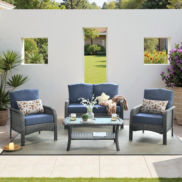 Hot Sale Gray 4-Piece Wicker Outdoor Lounge Chair Patio Seating Set with Denim Blue Cushion & Coffee Table for Backyard