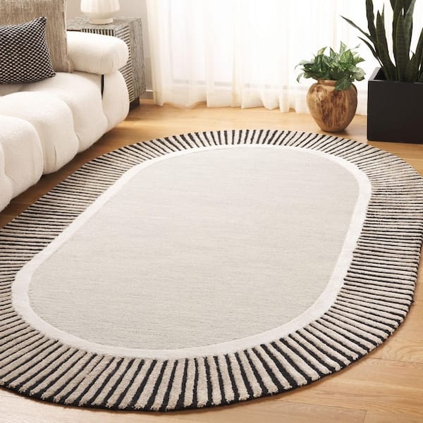 Fifth Avenue 5 ft. x 8 ft. Gray/Black Striped Border Solid Oval Area Rug