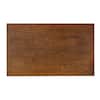 Close-up of the honey brown wood grain table top.