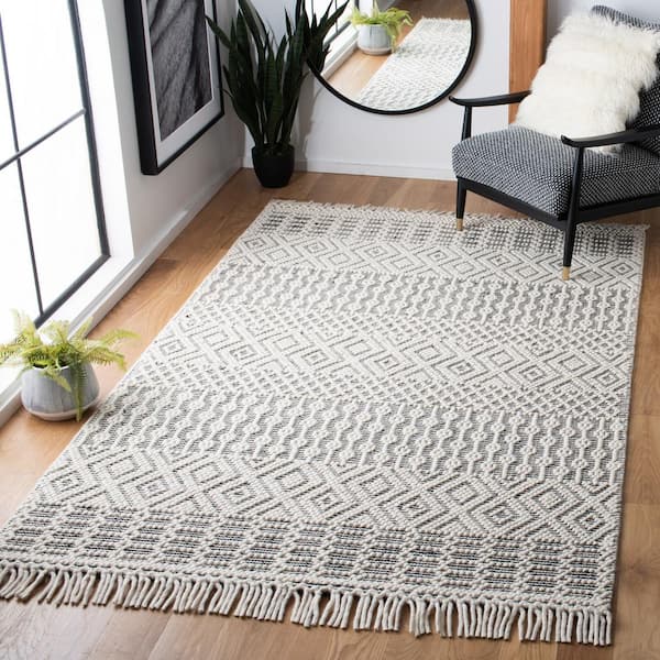 Natura 2 ft. x 4 ft. Ivory/Black Geometric Tribal Area Rug