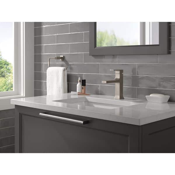 Velum Single Handle Single Hole Bathroom Faucet with Deckplate Included and Drain Kit Included in Stainless