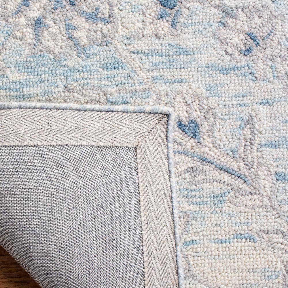 Elysian Bliss Light Blue/Ivory Hand-Tufted Wool Round Rug