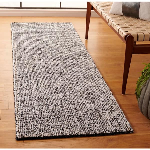 Ebony 2 ft. x 7 ft. Black/Ivory Abstract Noise Runner Rug