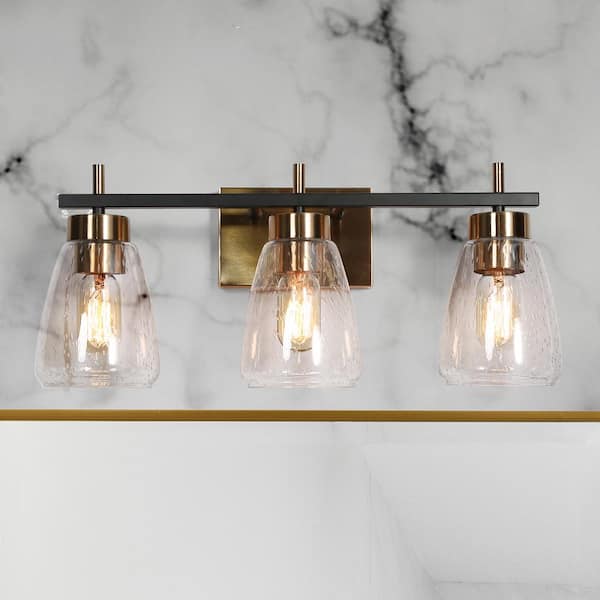 24 in. 3-Light Transitional Bathroom Vanity Light Black and Brass Powder Room Wall Sconce Light with Seeded Glass Shades