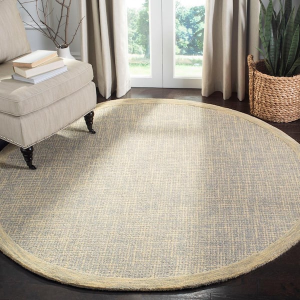 Abstract Gold/Gray 6 ft. x 6 ft. Round Border Area Rug